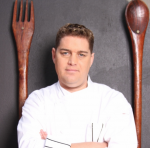chef stephen billigham headshot with arms folded