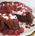 Rich chocolate mouse cake with raspberry coulis
